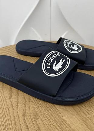 Нові оригінальні шльопанці lacoste