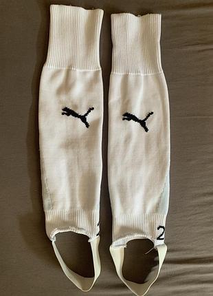 Футбольні гетри (гетри-рукави) бренду puma в білому кольорі.