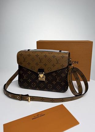 Pochette metis monogram brown