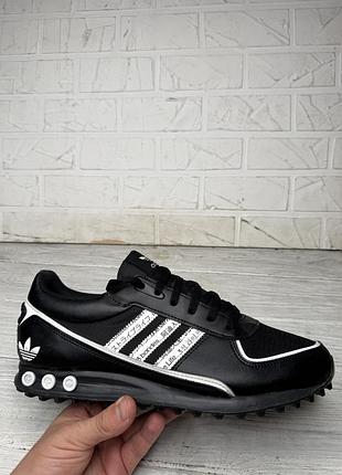 Черные крутые кроссовки adidas l.a treiner