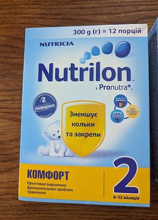 Смесь сухая на бутылку на бутилку кашка nutrilon 2 комфорт