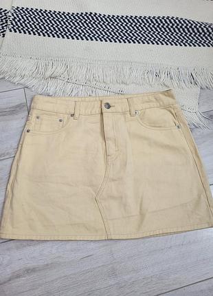 Джинсова міні спідниця  кольору "топлене молоко" жовта h&m 38, m