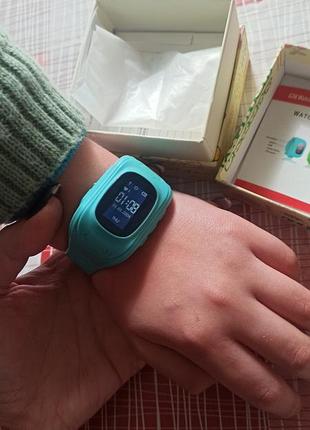 Детские смарт-часы модели smart baby watch q50 с gps-трекером, представленные в голубом цвете.