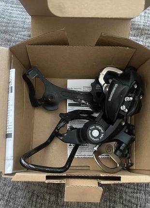 Задній перемикач shimano tourney rd-ty300-d (6/7 швидкостей)