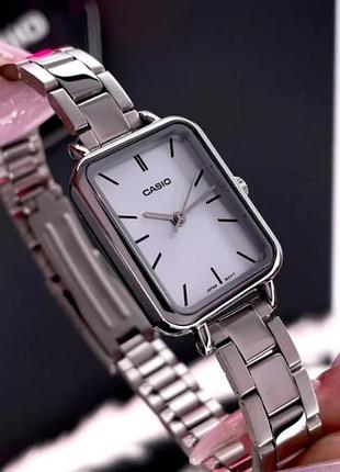 Жіночий годинник casio ltp-v009d-4e, колір: рожевий-сріблястий, женские часы