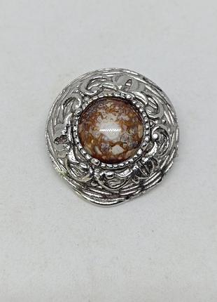 Брошка або дрес-кліпс