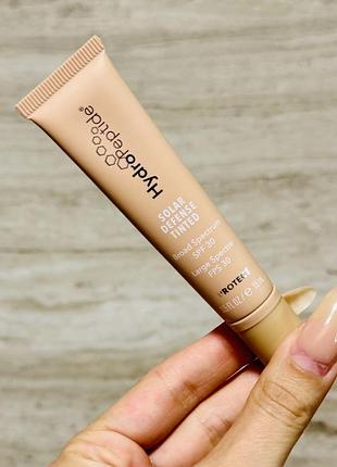 Сонцезахисний крем з тоном hydropeptide solar defense tinted spf 30 travel size