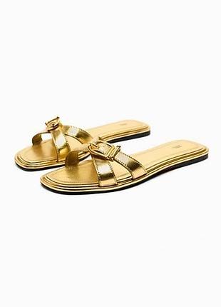 Золоті шльопки zara