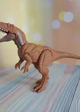 Фигурка динозавра мегалозавра из серии jurassic world wild roar от компании mattel