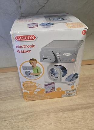 Продаю игрушечную стиральную машинку.