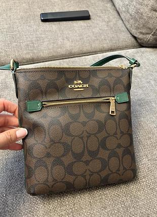 Coach mini rowan file bag in signature canvas оригінал