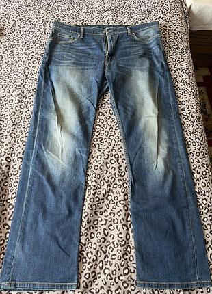 Levi’s чоловічі джинси сині з ефектом потертості на блискавці з ґудзиком w38 l 32