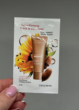 Clarins extra-firming крем для шиї та декольте 2 мл