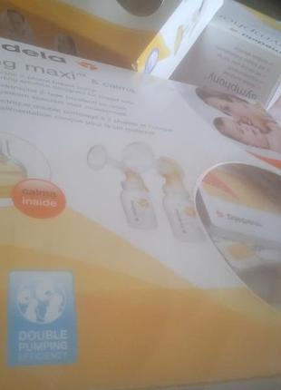 Молокоотсос "medela"