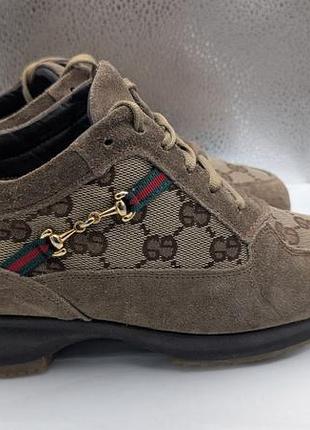 Кроссовки gucci выполнены из замши и фирменной ткани с монограммой gg