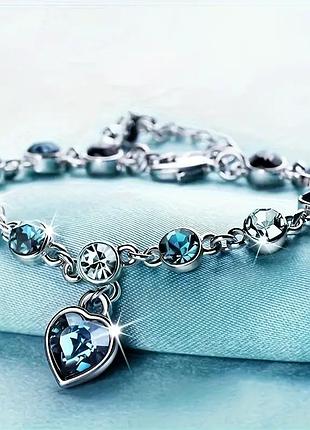 Браслет серце океану сині кристали ювелірний 19+5 см сріблястий aurumlux042