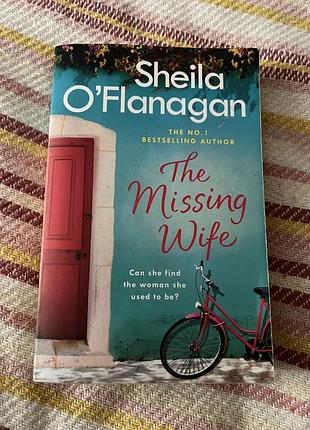 Книга англійською “the missing wife”