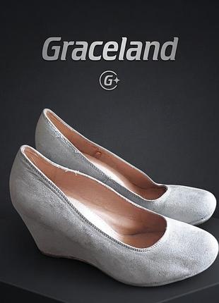 Жіночі туфлі на танкетці,нові,недорогі,
човники graceland,р.39