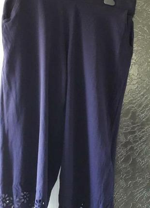 Tcm
48/.xl/50

жіночі бавовняні бріджі  фіолетового кольору з прошвою по низу
ідеальний стан