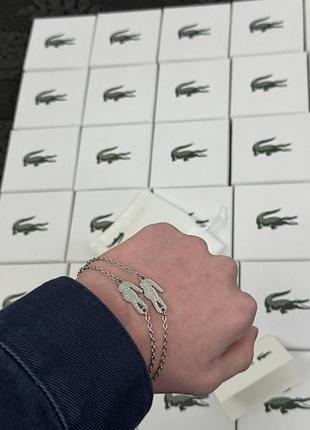 Женский браслет lacoste с фирменным крокодилом