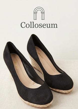 Жіночі туфлі на танкетці,нові,недорогі
човники colloseum,р.39