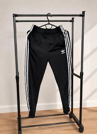Оригінальні підліткові спортивні штани adidas originals sst track pants