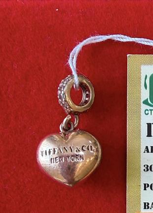 Золота підвіска шарм серце з фіанітами.