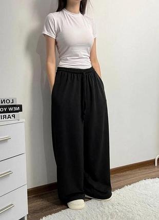 Брюки женские трикотажные широкие на кулиске р. 42-46 черный (34/706)