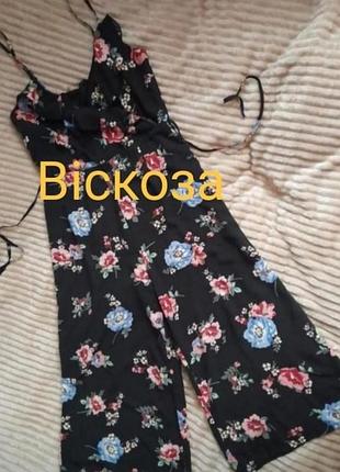 Комбинезон черного цвета с принтом от бренда primark