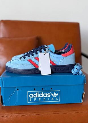 Adidas c.p. company x gt manchester spezial 'light blue bright red'