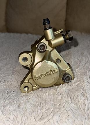 Гальмівний супорт передній brembo