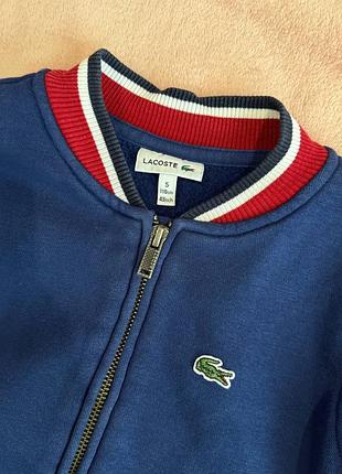 Теплий бомбер lacoste
