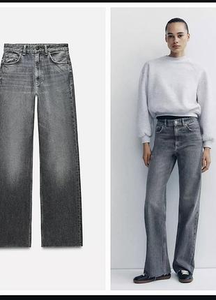 Сірі джинси zara з необробленими краями