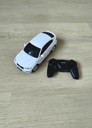 Машинка bmw x-6 на пульті керування фірми rastar