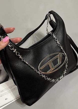Чорна жіноча сумка в стилі diesel