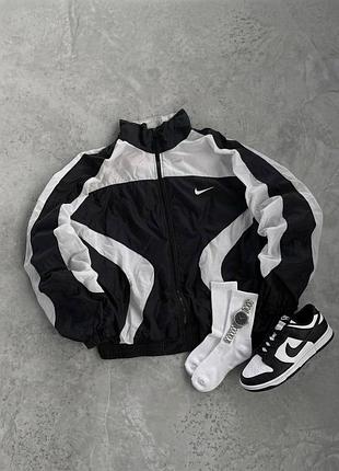 Чоловіча вітровка nike в чорному кольорі