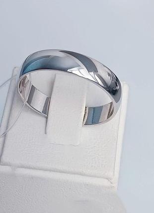 Серебряное обручальное кольцо.