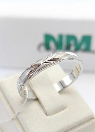 Серебряное обручальное кольцо.