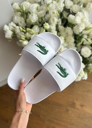 Шльопанці білі жіночі lacoste