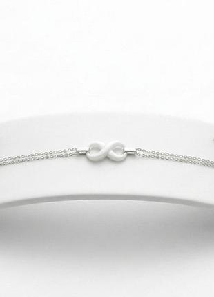 Серебряный браслет с белой керамикой 19.5 + 2 см.
