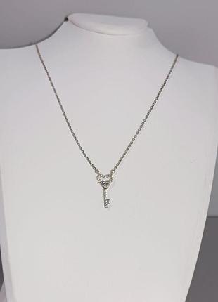 Серебряное колье "ключик" с камнями из кубического циркония. 40 см.
