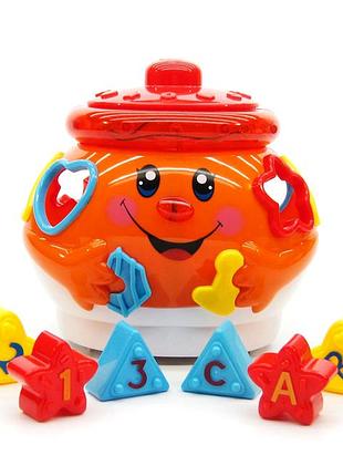 Сортер розвивальний із музичними ефектами 6 фігурок для малюків жовтогарячий mc-8295