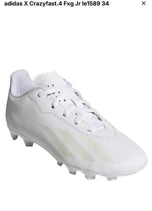 Це дитячі футбольні бутси adidas x crazyfast.4 fxg в білому кольорі (модель ie1589)