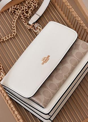 Сумка coach mini klare crossbody in signature canvas біло-пудровий