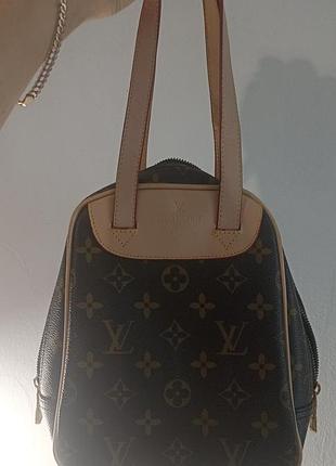 Стильная сумка louis vuitton.