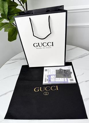 Фирменная упаковка gucci, упаковка на подарок. подарочная брендовая упаковка гуччи