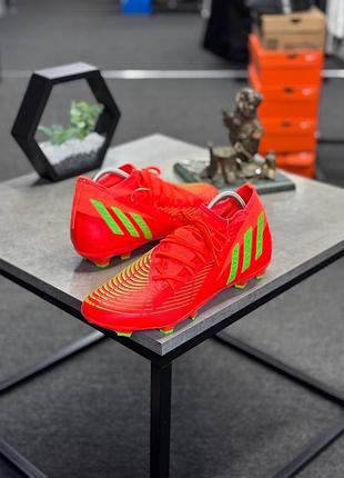 Футбольні бутси — adidas predator edge.3 multi-ground, модель gw0957, виконані в яскравому помаранчевому кольорі з салатовими акцентами.