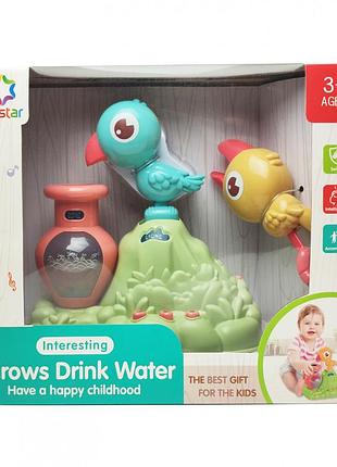 Игра "птички пьют воду" 25876е светиться синяяптичка