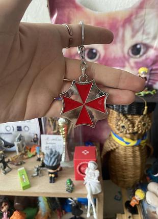 Металевий брелок на тематику гри resident evil umbrella