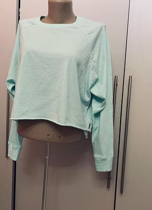 Вкорочений світшот dkny sport у ніжному мʼятному кольорі